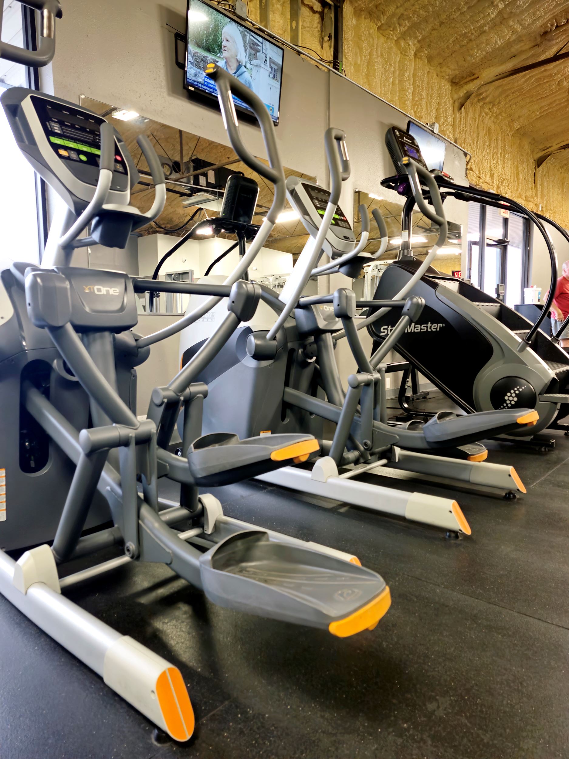 Row of exercise equipment