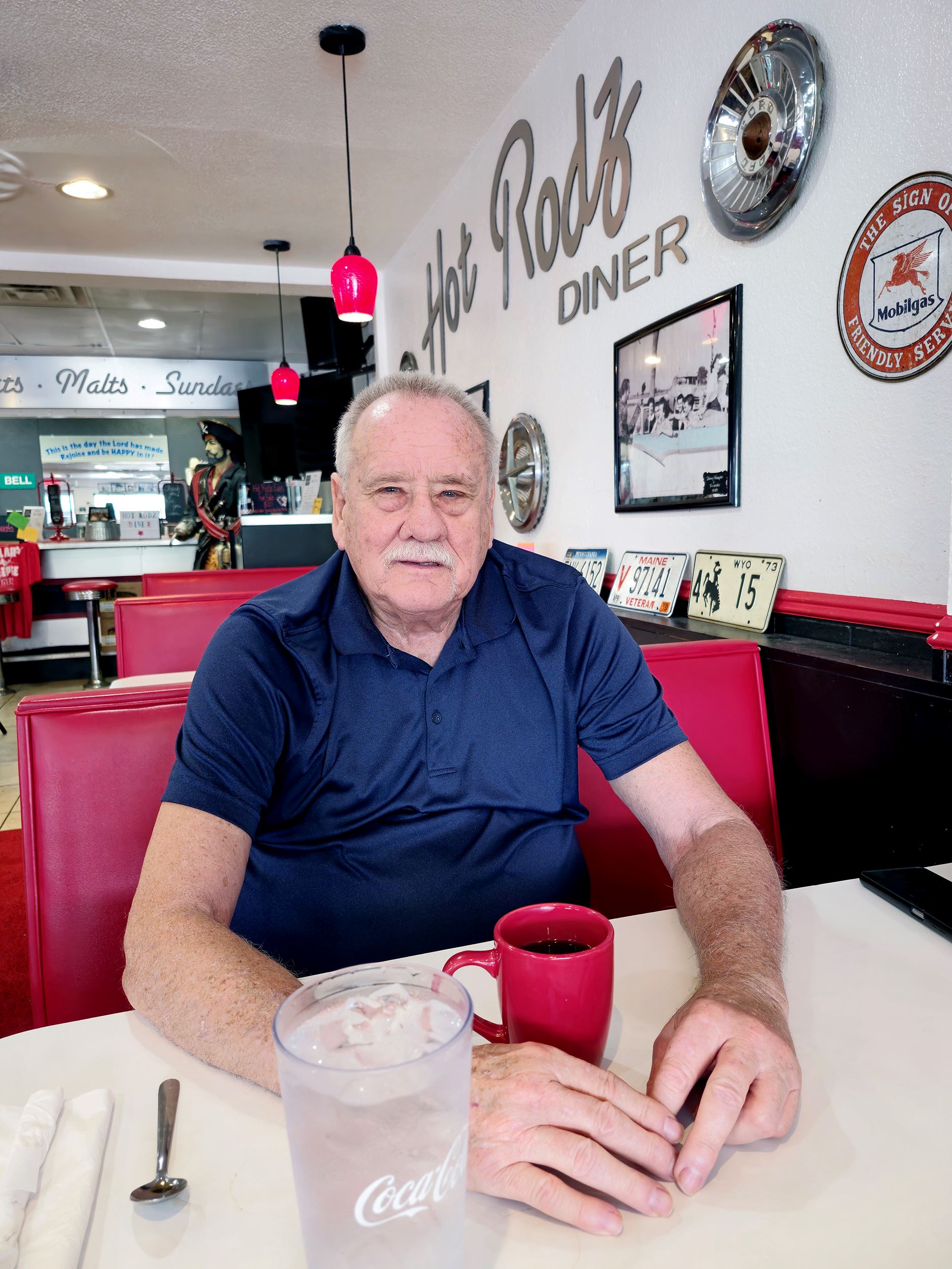 Happy customer waiting for his food at Hot Rodz Diner