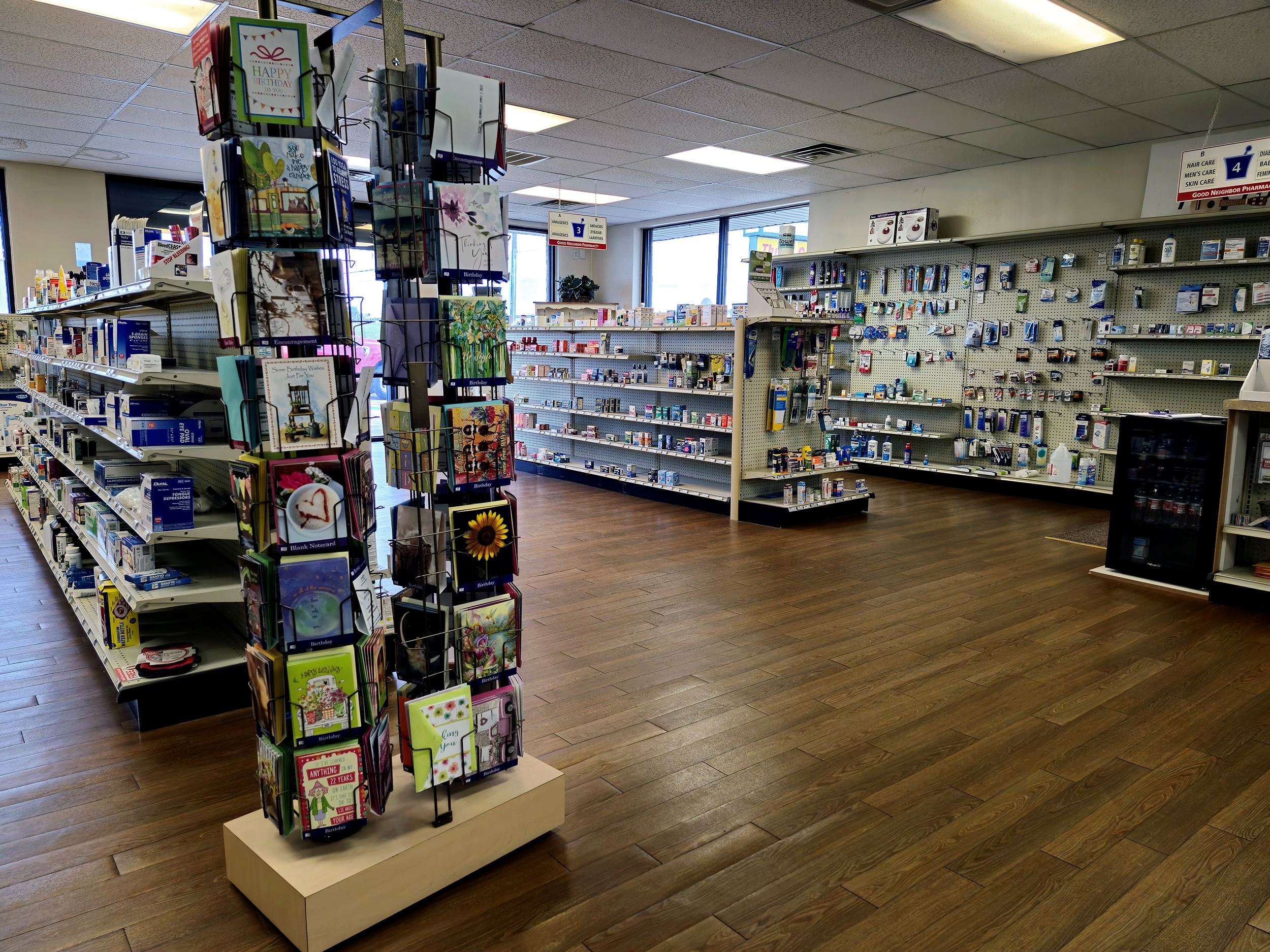 Rows of medications with a card tree in the forefront