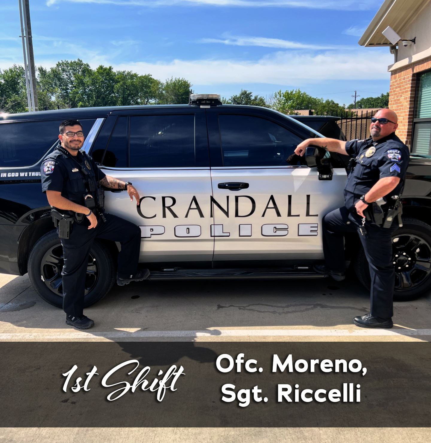 1st Police Officer Shift standing in front of patrol SUV